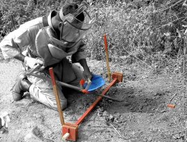 deminer using excavator in Sri Lanka